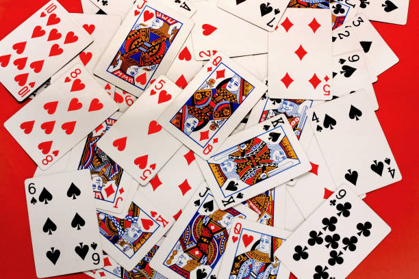 istock Poker card copy space on red background 1063984718