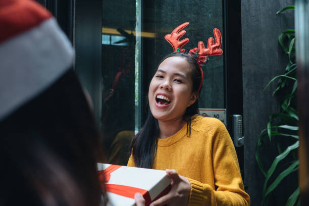istock Malaysian Exchanges Gifts During Christmas Day 1063986810