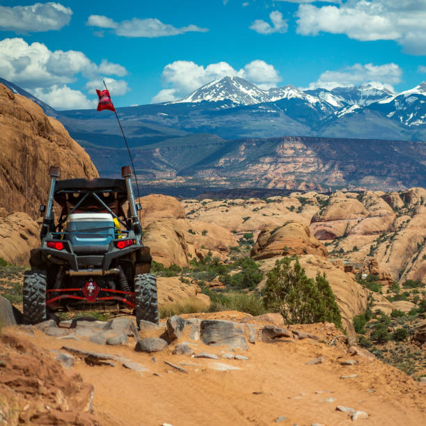 istock Off road vehicle and La Sal Mountain view in Moab 1064003038