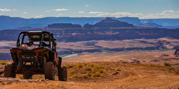 istock Off road vehicle and striking cliffs in Moab Utah 1064003046