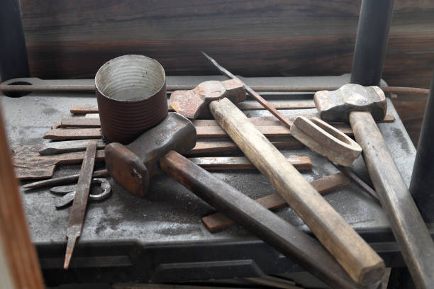 istock Old vitnage hammer and tools used by blacksmith in barn 1064003578