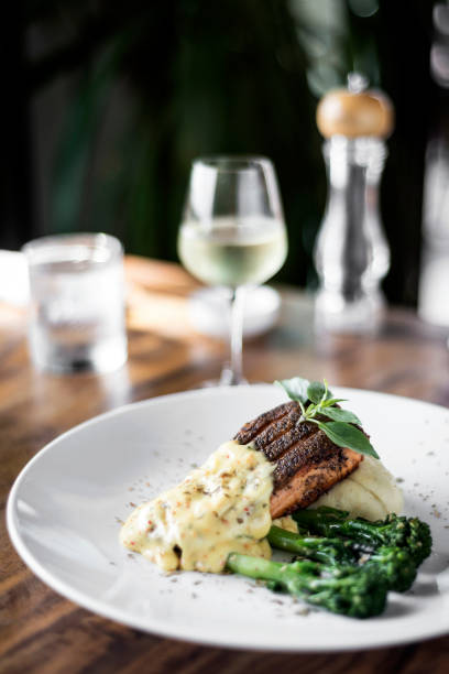 istock grilled salmon fish fillet with mashed potato and dijon mustard cream sauce 1064005496