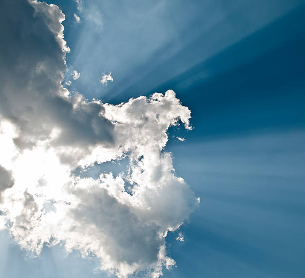 istock Skyscape. Blue overcast sky. Rays of light break through clouds. 106401215