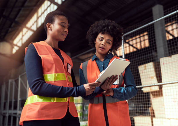 istock Keeping an eye on the production line from their smart device 1064019220