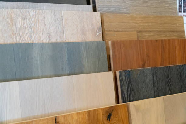 istock Wood flooring samples selection in rack in retail store with no people 1064020098