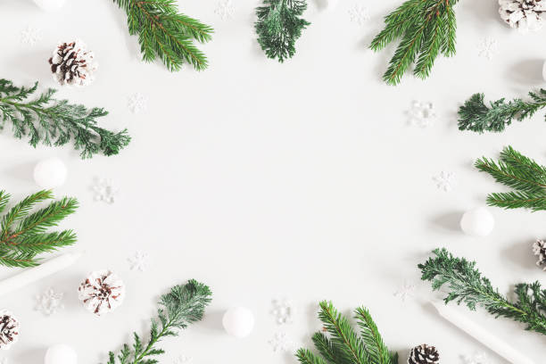 istock Christmas composition. Christmas decorations, fir tree branches,. pine cones on pastel gray background. Flat lay, top view, copy space 1064021552