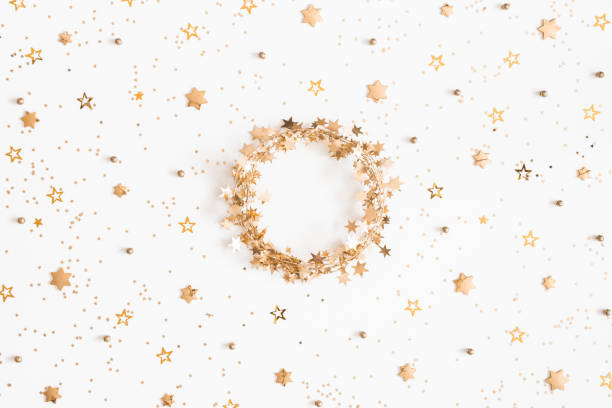istock Christmas composition. Christmas wreath, golden decorations on white background. Flat lay, top view, copy space 1064021574