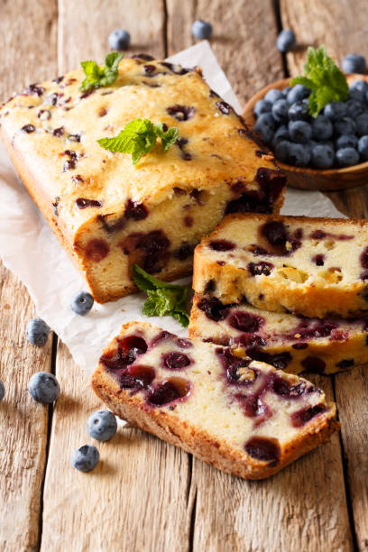 istock sweet sliced blueberry bread muffin with mint closeup. vertical 1064027038