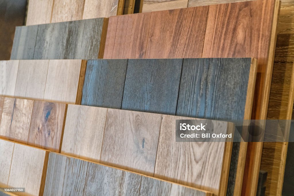 Wood flooring samples selection in rack in retail store with no people Hardwood Stock Photo