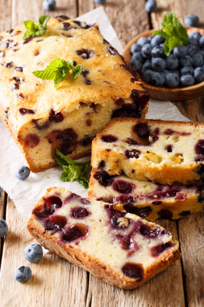 istock Homemade sliced blueberry bread muffin cake close-up. vertical 1064027312