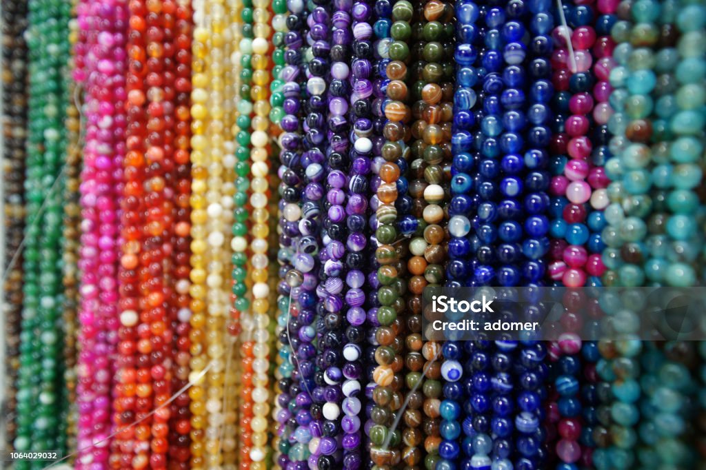 Multicolored Beads Hanging Stock Photo - Download Image Now - Bead