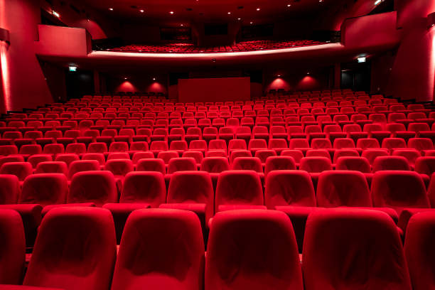 Red seats in theather Cinema theater with Red Seats.
Red and empty theater seats in a row concert hall photos stock pictures, royalty-free photos & images