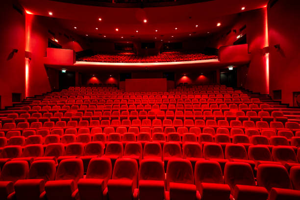 Red seats in theather Cinema theater with Red Seats.
Red and empty theater seats in a row theather stock pictures, royalty-free photos & images