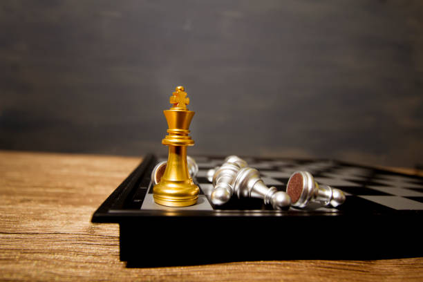 istock Victory pieces and failed pieces, competition and game, king and fallen soldiers 1064033530