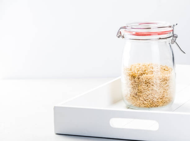 istock Rice in a Glass Jar - space for text 1064033736