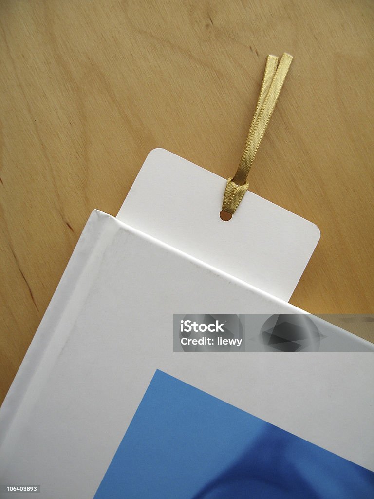 Bookmark A closed book with bookmark. Advice Stock Photo