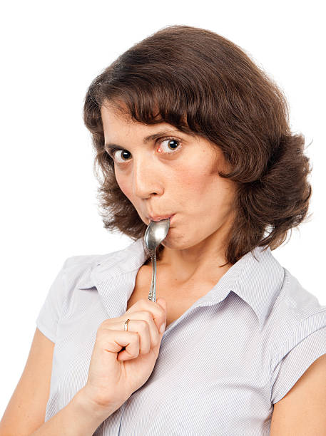 istock Pretty girl licks the spoon 106404146