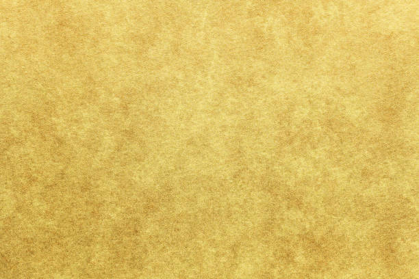istock New year gold colored paper texture or vintage background 1064045244