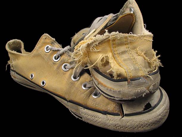 afsnit Kritisere jordnødder Pair Of Grungy Old Yellow Basketball Shoes Stock Photo - Download Image Now  - Abandoned, Canvas Shoe, Clothing - iStock