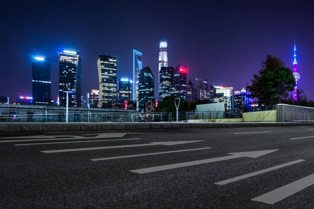 istock Empty floor with modern skyline and buildings at night in Shanghai 1064048826