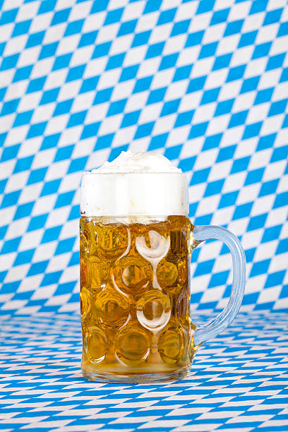 Beer Fest Ma&#223;krug with foam crown and Bavarian flag stock photo
