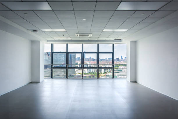 istock interior empty office room with white wallpaper without furnitur 1064054660