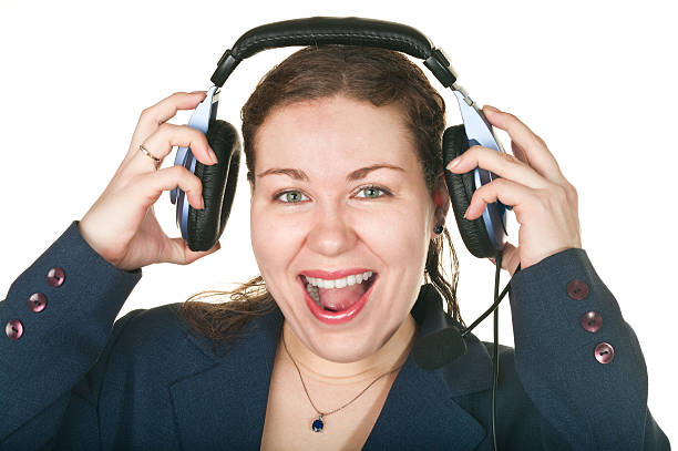 istock Laughing happy operator young woman in a call center 106405532