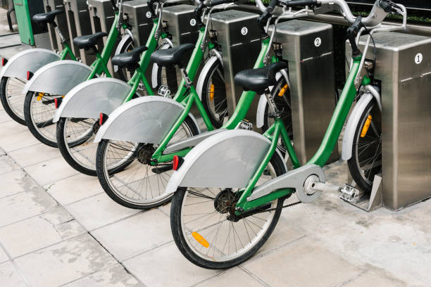 istock Row of parked rental bikes 1064059058