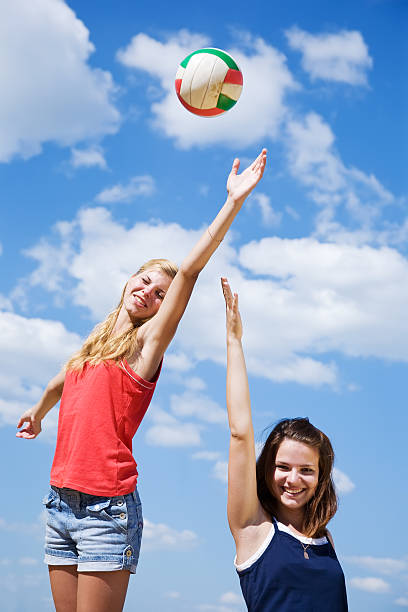 istock Young girls playing volleyball 106406322