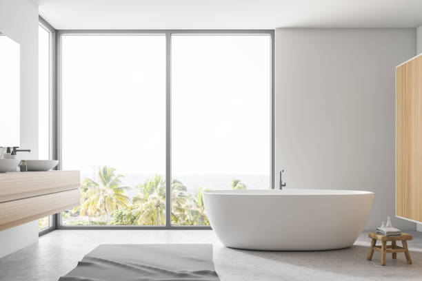istock White bathroom interior, tub and sink 1064065258