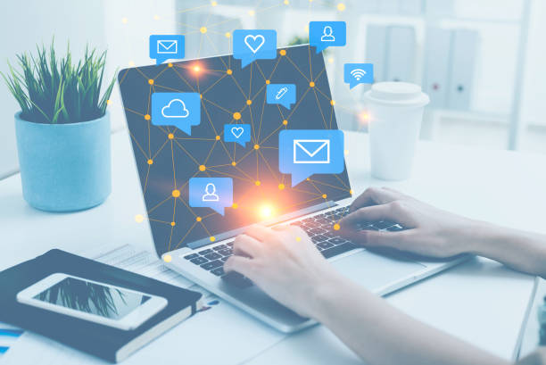 istock Woman hands typing on laptop, social media 1064065634