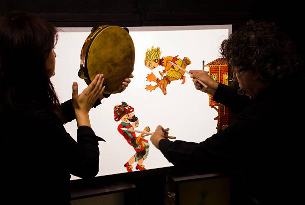 istock Backstage view of a Karagoz Master and his assistant on show 106406876