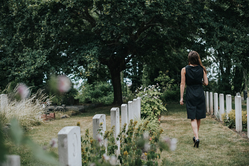 Young widow at the grave