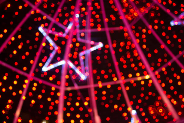 istock defocused christmas lights background. christmas background. bokeh background 1064071500
