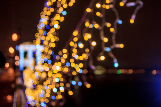 istock defocused christmas lights background. christmas background. bokeh background 1064071522