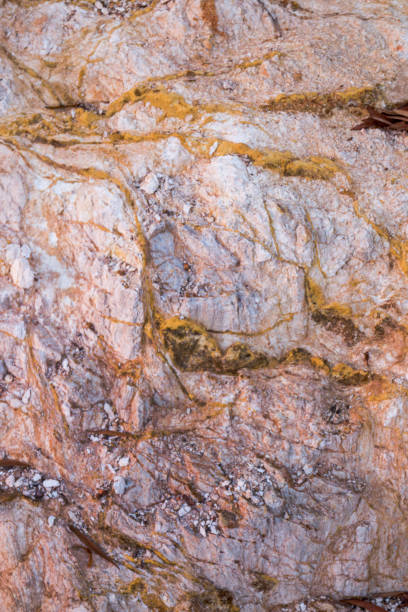 istock Rock texture with deposits of sulfur 1064073938