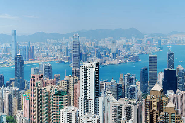 Hong Kong and Victoria Harbour  international commerce center stock pictures, royalty-free photos & images