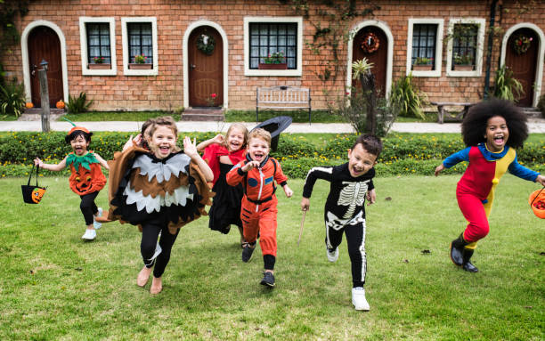 istock Little kids at a Halloween party 1064074816