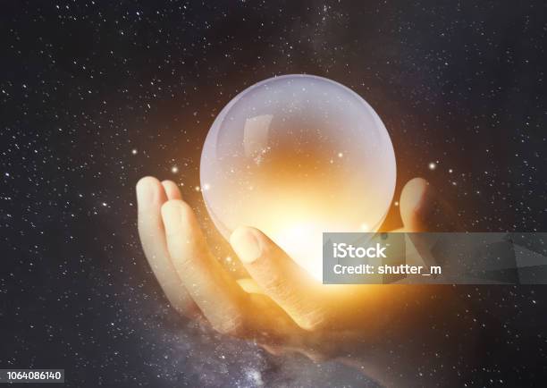 Geschäftsmann Hand Mit Kristallklaren Kugel Mit Galaxie Universum Weltraum Hintergrund Stockfoto und mehr Bilder von Kristallkugel