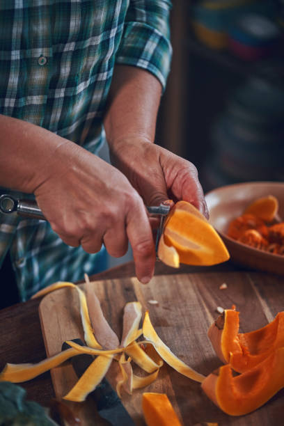 istock Preparing Pumpkin Stew with Chickpeas, Celery and Lentils 1064091676