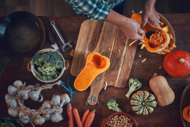 istock Preparing Pumpkin Stew with Chickpeas, Celery and Lentils 1064091684