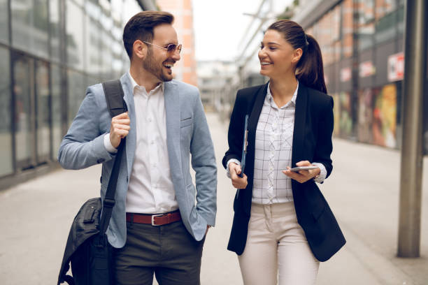 istock Two business people on their way to work 1064106514