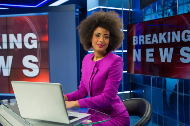 istock Breaking news female anchor 1064110400