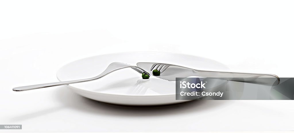 Prato vazio com garfo e faca - Foto de stock de Alimentação Saudável royalty-free