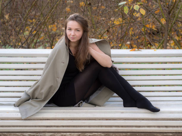 istock girl in a raincoat 1064112520