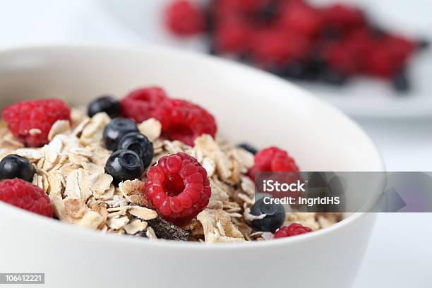 Breakfast Bowl Full Of Granola And Mixed Berries Stock Photo - Download Image Now - Berry Fruit, Blue, Blueberry