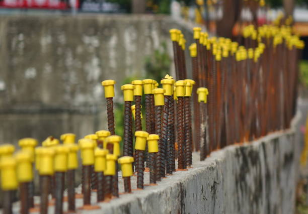 Rebar Steel with Yellow Protection Caps stock photo