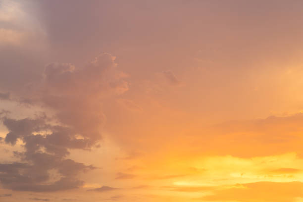istock sun set sky with cloud background in evening. twilight sky. 1064131672