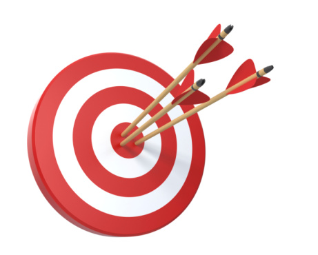 Close up shot red darts arrows in the target  of dartboard center on dark blue sky background. Business target or goal success and winner concept.