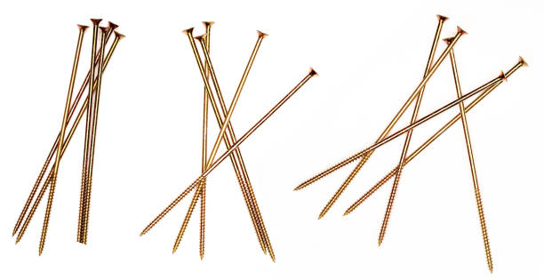 istock Long Golden Screws pile. 1064142524